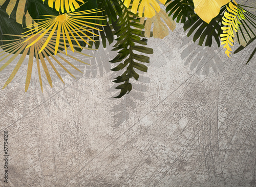 Tropical gold and green exotic nature leaves on old grey stone and concrete wallpaper © Batsa