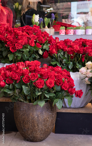 Variety of fresh cut red roses in the flower garden shop.