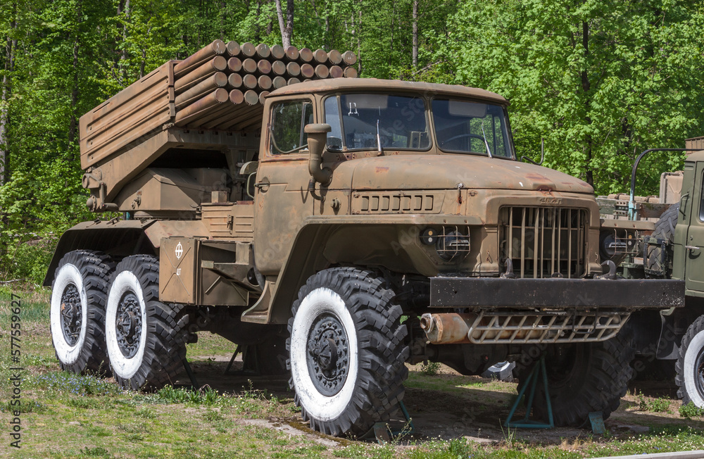 View of an old abandoned rusty soviet self-propelled multiple launch rocket system (MLRS) BM-21 Grad standing outdoors in Ukraine View of an old abandoned rusty soviet self-propelled multiple launch rocket system (MLRS) BM-21 Grad standing outdoors in Ukraine