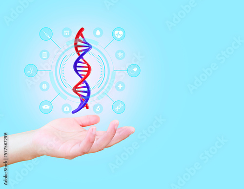 DNA molecule. The doctor's hand makes chromosome analysis of genetic DNA. Biotechnology and modern medicine. Isolated on light blue background.