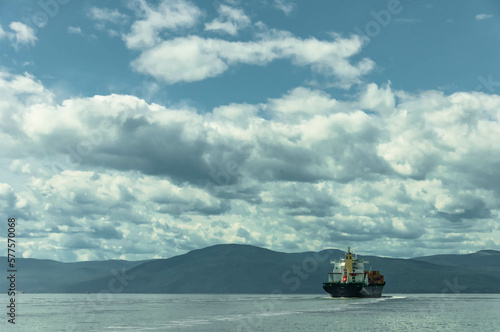 container ship on St Lawrence river coming  from Panama arriving in port of Quebec, Canada