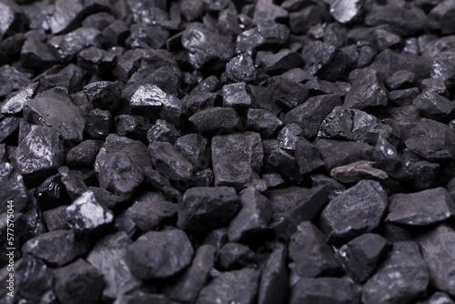 Pieces of black coal as background, closeup