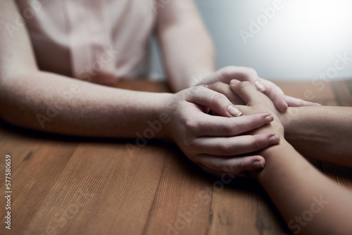 Youll always have my support. Shot of two people holding hands in comfort.