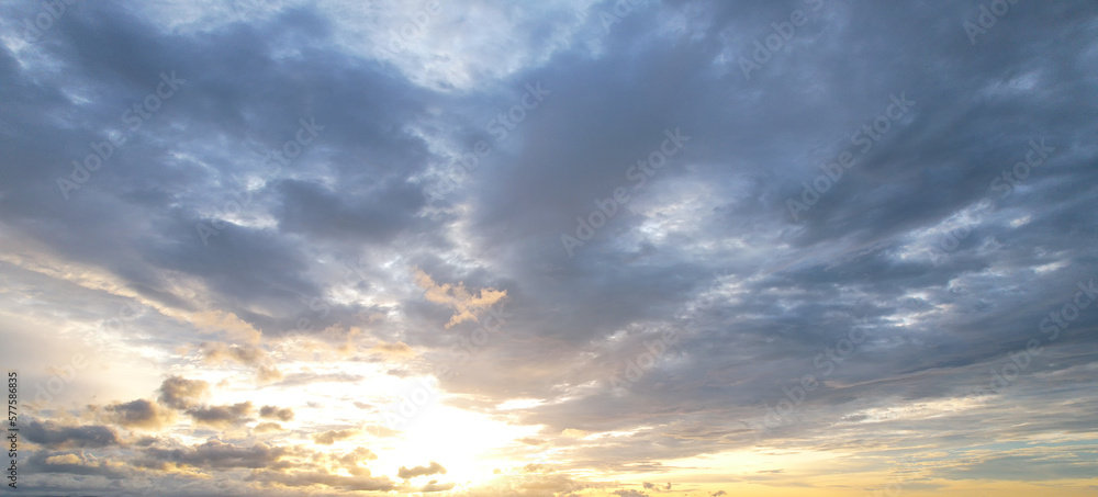 soft light of the evening sun shines on the gray clouds. soft light of the evening sun shines on the gray clouds.