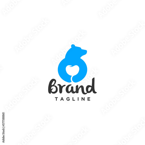 Creative Bear Care Dental Logo. The big blue bear hugs a tooth.