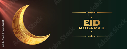 eid mubarak holiday banner with light effect on golden moon