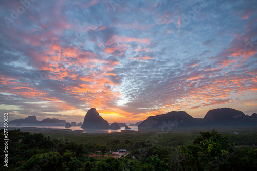 aerial view Amazing light of nature cloudscape sky above Samed Nang Chee Phang Nga archipelago. .High peaks wonderful morning sunrise natural Landscape. .Beautiful sunset tropical landscape 