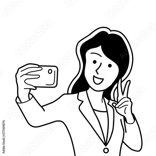 スマホで自撮りするビジネスウーマン