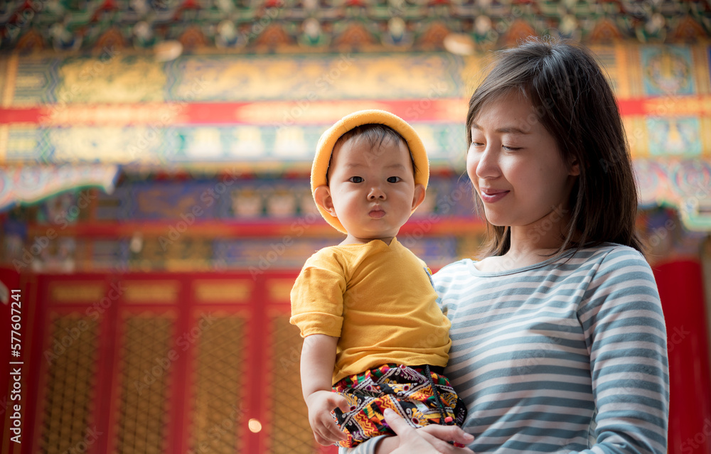 Chinese mother and son at temple Chinese mother and son at temple