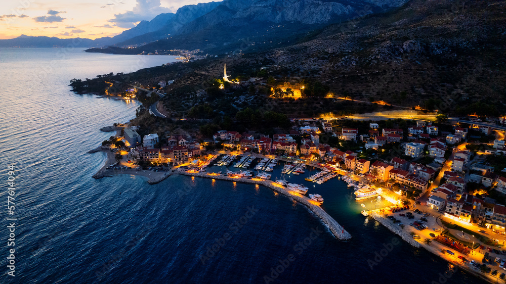 Take in the breathtaking view of Croatia's ports and marinas from above, showcasing luxurious yachts in a stunning drone photo.