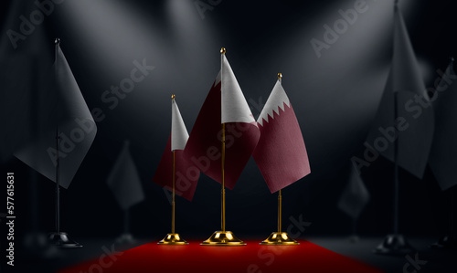 The Qatar national flag on the red carpet