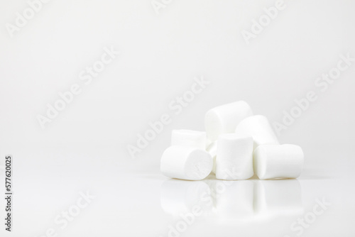 White marshmallows on a white background.
