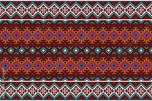 Ethnic pattern wallpaper. traditional pattern background It is a pattern geometric shapes. Create beautiful fabric patterns. Design for print. Using in the fashion industry.