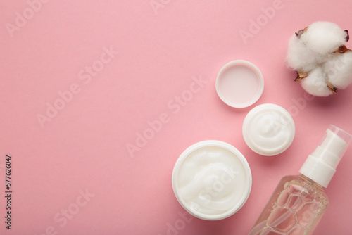 Face cream moisturizer in a jar on pink background. Luxury skincare cosmetics and anti-aging product for healthy skin and beauty routine