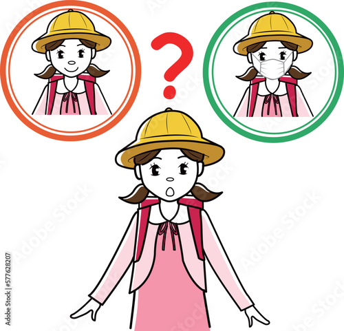 マスクをするかどうか迷う小学生