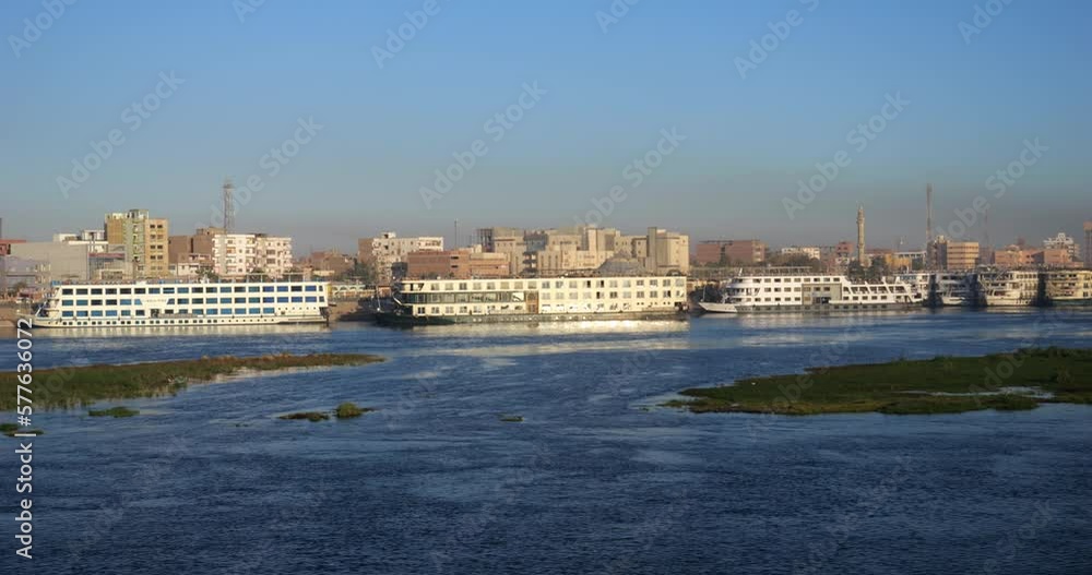 Cruise ships docked on the river Nile in Aswan, Egypt. Cruise ships docked on the river Nile in Aswan, Egypt.