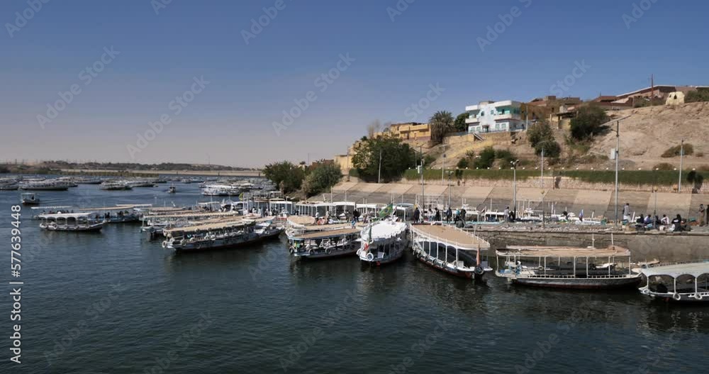 Boats awaiting to take tourists to The Temple of Philae, Lake Nasser, Aswan , Egypt Boats awaiting to take tourists to The Temple of Philae, Lake Nasser, Aswan , Egypt