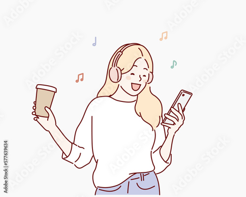 Woman drinking coffee while putting on an earphone to listen to music. Hand drawn style vector design illustrations.