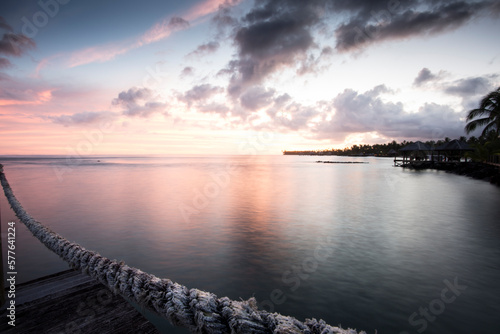 Wallpaper Mural Dusk photograph off a dock on Samoa, pink light in the sunset. Torontodigital.ca