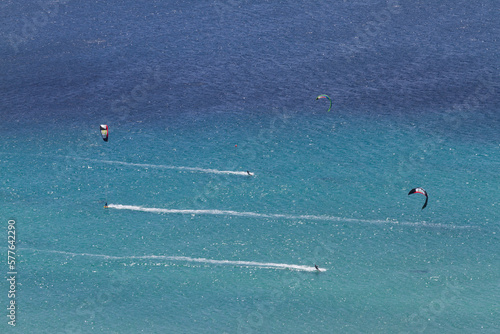 Aerial photo of 3 (three) kitesurfers in Fuerteventura's famous Sotavento beach. In Sotavento beach every year the kitesurf and windsurf world championship is held. photo