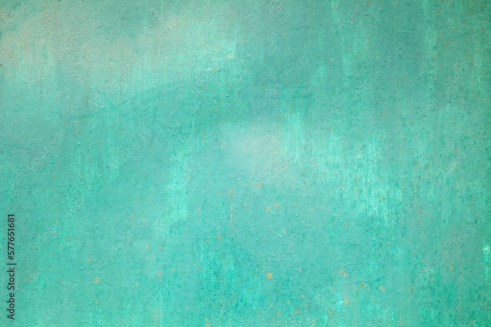 Roughly painted with green paint metal surface, background wallpaper, uniform texture pattern