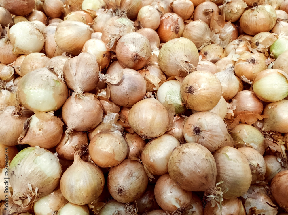 Full Frame Shot Of Purple Onions. Fresh whole purple onions and one sliced onion. Full Frame Shot Of Purple Onions. Fresh whole purple onions and one sliced onion.