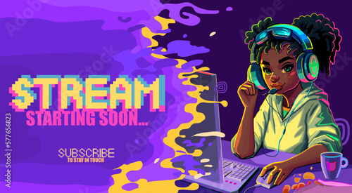 African girl gamer or streamer in a hijab and a headset sits at a computer