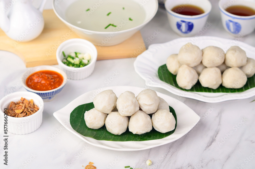 Fish balls are rounded meat balls made from fish paste which are then boiled
Fish balls are rounded meat balls made from fish paste which are then boiled
