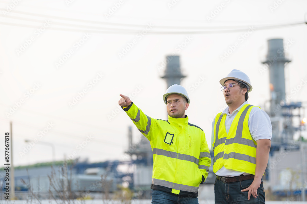 Group Asian man petrochemical engineer working at oil and gas refinery plant industry factory,The people worker man engineer work control at power plant energy industry manufacturing Group Asian man petrochemical engineer working at oil and gas refinery plant industry factory,The people worker man engineer work control at power plant energy industry manufacturing