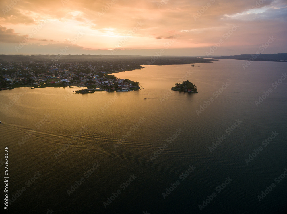 Santa Barbara Museum in Flores, Guatemala. Sunset Light with Lake Peten Itza in background. Santa Barbara Museum in Flores, Guatemala. Sunset Light with Lake Peten Itza in background.