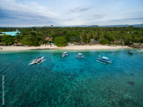 Fototapeta Naklejka Na Ścianę i Meble -  White Beach Moalboal in Cebu, Palawan, Philippines. Boat and Ocean Water and Beach.