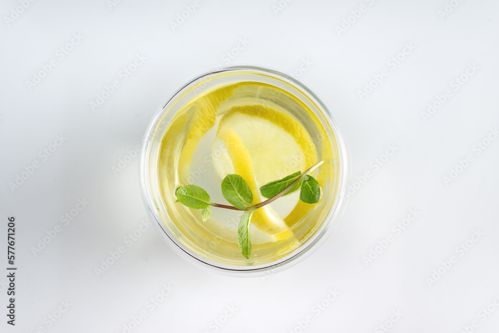 a glass of water, lemon and mint, a copy of cosmic, flat lay a glass of water, lemon and mint, a copy of cosmic, flat lay