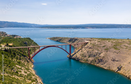 Maslenica Bridge Most in Croatia. The Maslenica Bridge is a deck arch bridge carrying the state road spanning the Novsko Zdrilo strait of the Adriatic Sea