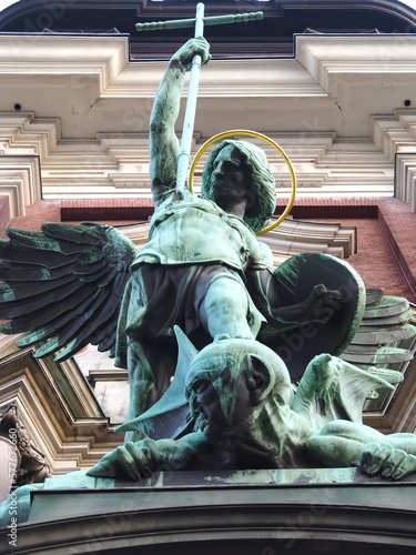 Sculpture of Archangel Michael fighting Satan at St. Michaelis Church in Hamburg