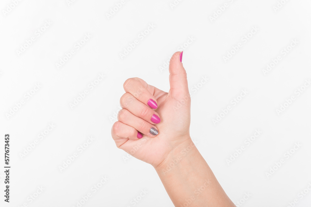Woman Hand With Polish Nails Show Thumbs Up. White Background. Woman Hand With Polish Nails Show Thumbs Up. White Background.