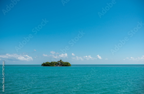 Unknown Lonely Island In Caribbean Sea. Clear Blue Water and Sky. Caribbean Island