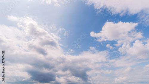 Fototapeta Naklejka Na Ścianę i Meble -  Panoramic view of clear blue sky and clouds, Blue sky background with tiny clouds. White fluffy clouds in the blue sky.