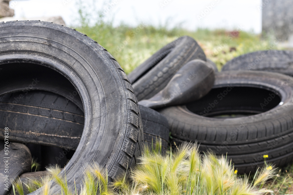 used car tires pile in the tire repair shop yard used car tires pile in the tire repair shop yard