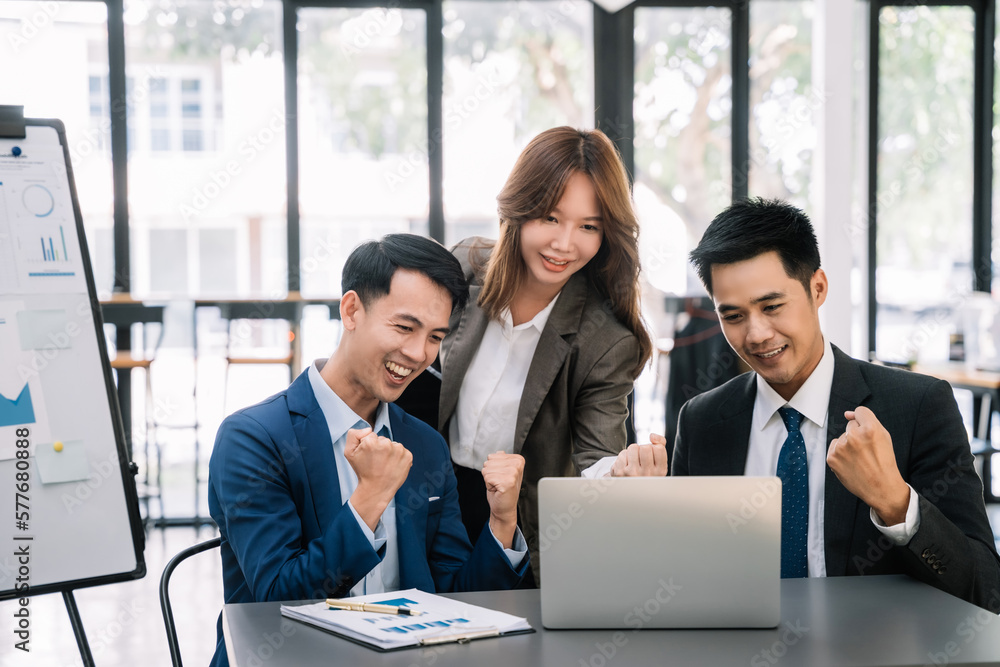 Happy smiling businessman feel happy work complete Teamwork success/success at work in the office concept. Happy smiling businessman feel happy work complete Teamwork success/success at work in the office concept.