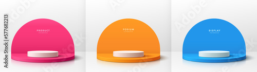 Set of 3D pink, orange, blue realistic cylinder pedestal podium in empty white clean room. Minimal wall scene mockup product stage showcase, Banner promotion display. Abstract vector geometric forms.