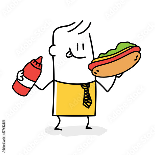 Man eats a hot dog and holds ketchup.