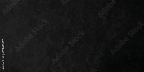 Dark black stone wall grunge backdrop texture background. monochrome slate grunge concrete wall black backdrop vintage marbled textured border background.
