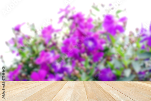 Wooden table on purple flower for background