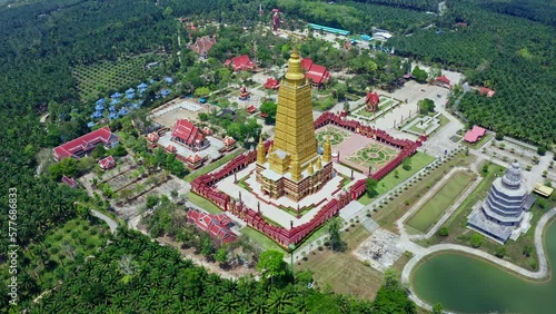 Wat Mahathat Wachiramongkol (Wat Bang Tong) at Na Nuea, Ao Luek District, Krabi, Thailand. Aerial view of buddhist temple. Amazing big beautiful temple in Thailand photo