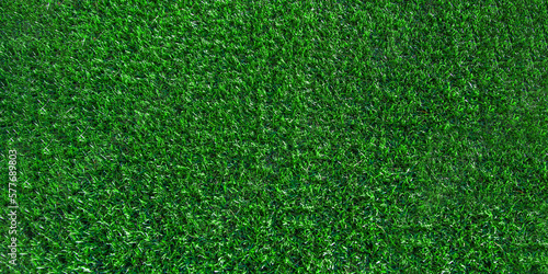 Fototapeta Naklejka Na Ścianę i Meble -  Green grass background, banner. Turf, soccer field, green grass artificial turf, texture, top view. summer lawn background