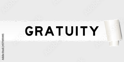 Ripped gray paper background that have word gratuity under torn part