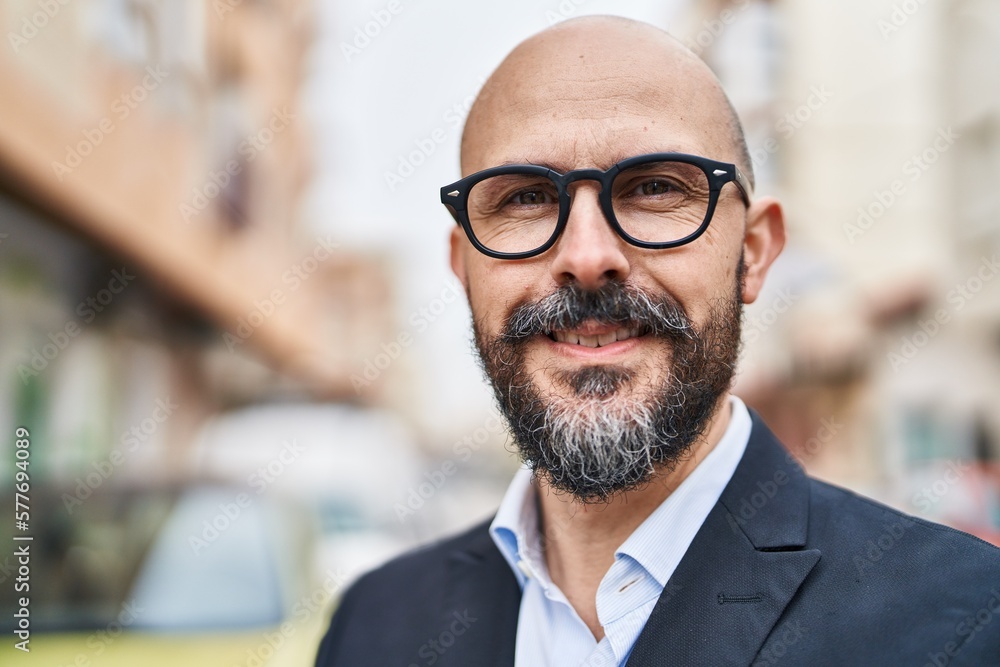 Young bald man business worker smiling confident standng at street Young bald man business worker smiling confident standng at street