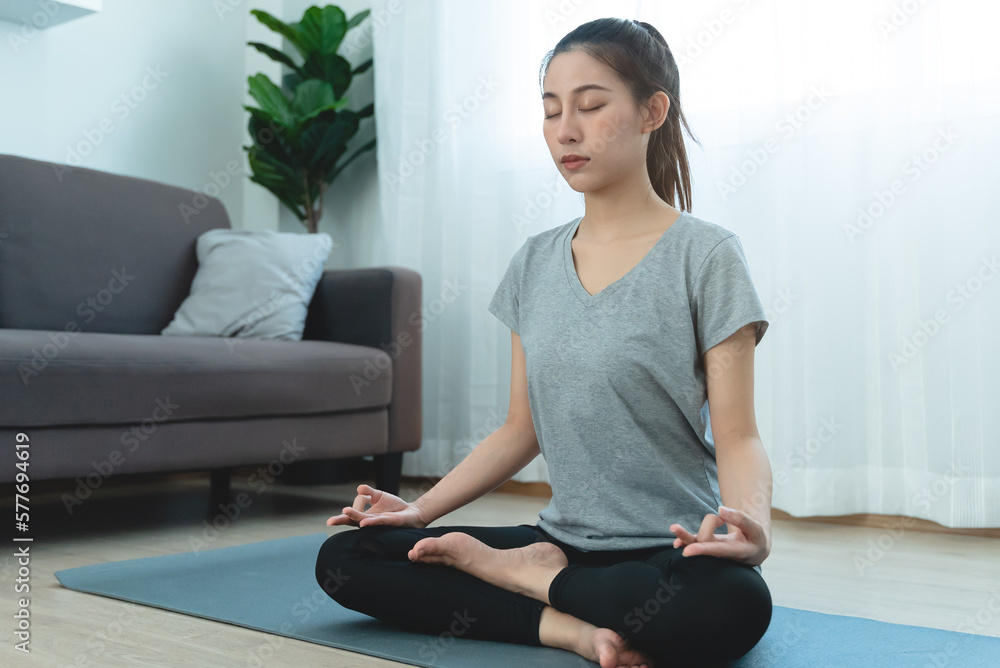 Women doing meditation to practice concentration Women doing meditation to practice concentration