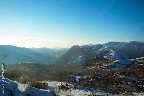 Sunset over the village in the mountains