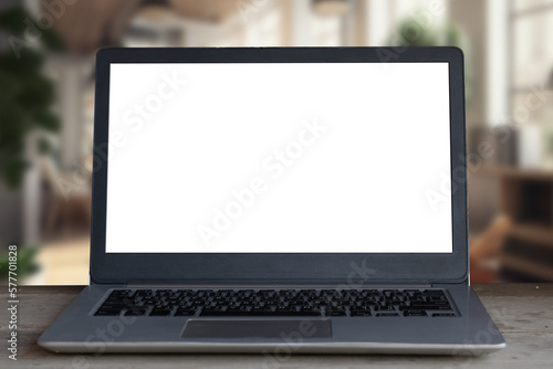 Wallpaper Mural Laptop computer on desk at office or co-working space, Laptop with white blank on screen and blurred background , working space concept. Torontodigital.ca